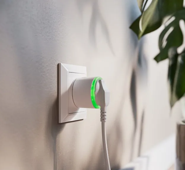 HomeWizard Energy Socket in een stopcontact om het stroomverbruik van een apparaat te meten